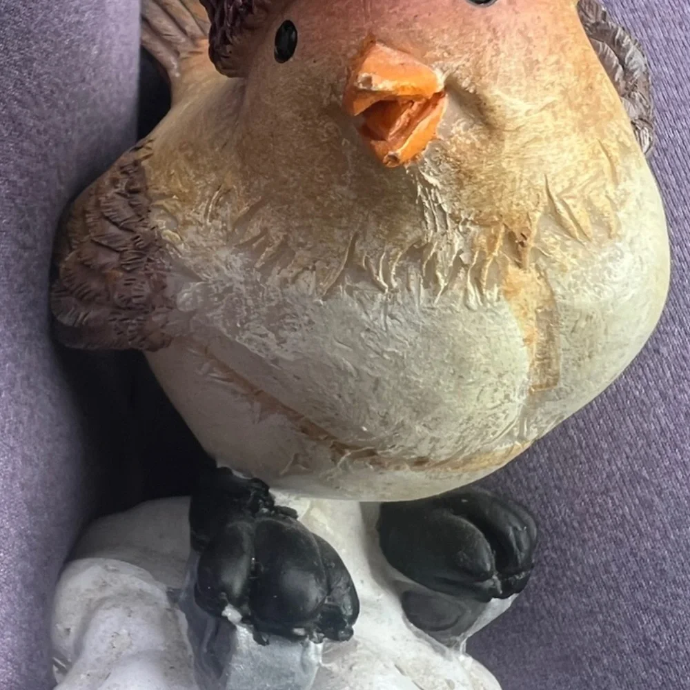Adorable Small Bird figurine With Winter Hat And Ice Skates. In good condition.